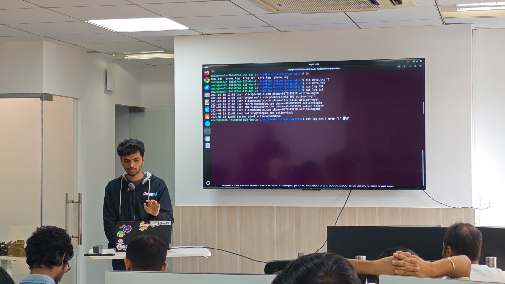 Speaker presenting terminal log analysis commands on screen