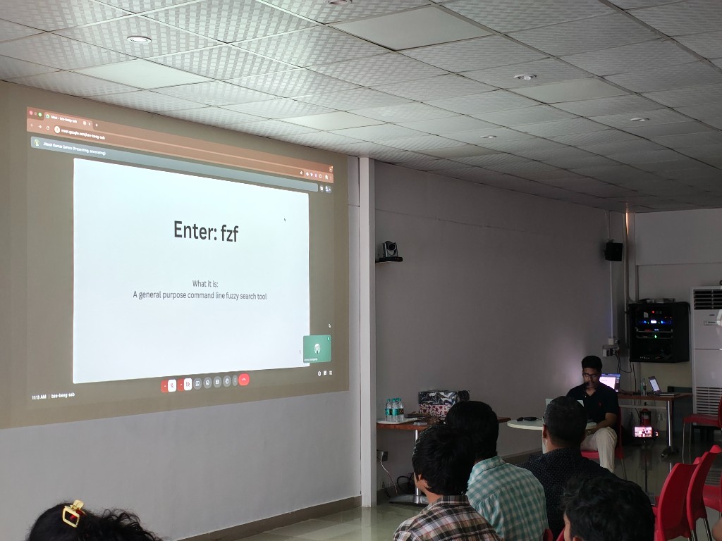 Projected Enter fzf slide during Jitesh Kumar Sahoo's talk